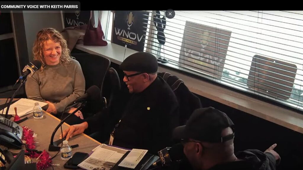 Man and women sitting in a room